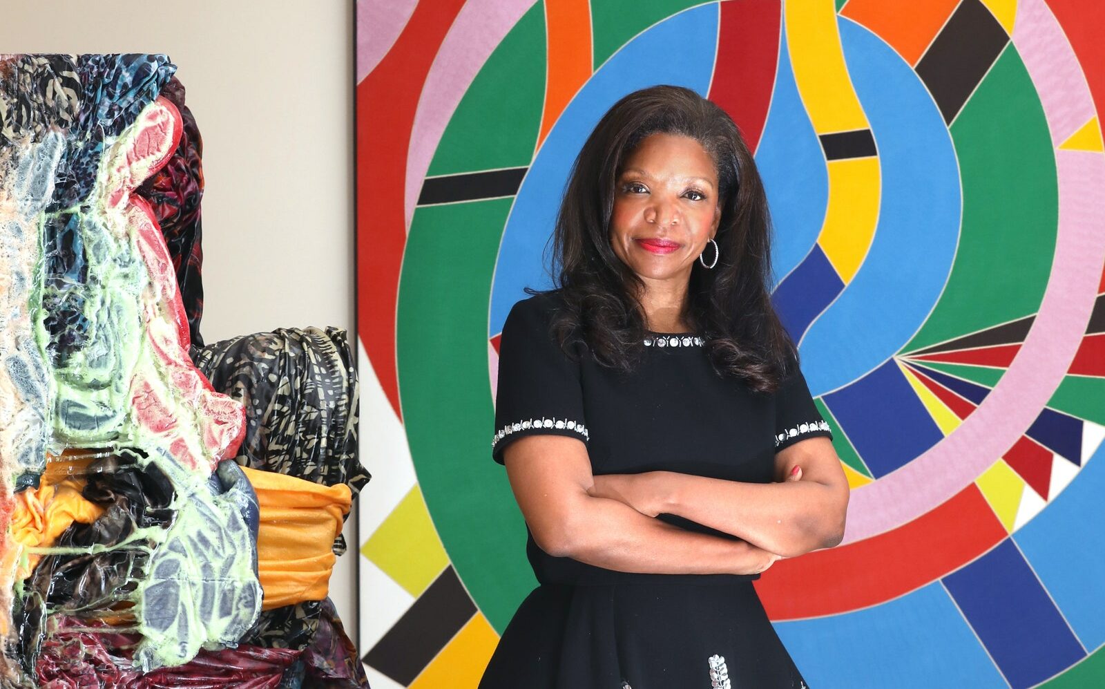 Joyner in 2019, pictured with a sculpture from Kevin Beasley called Aurora, 2018. At right is a painting Eastern Star, 1971, from William T. Williams.